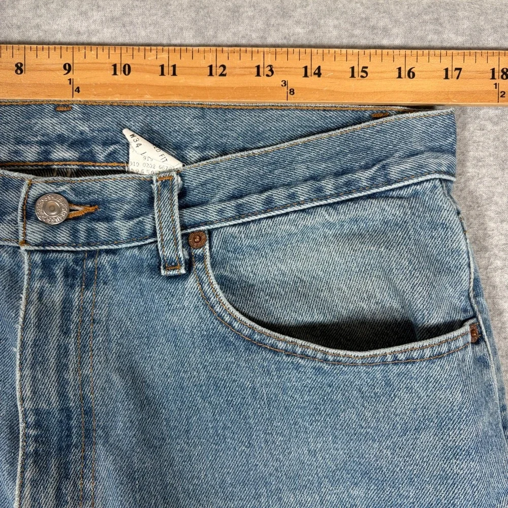 Vintage Levi's 550 Jeans Mens 34x32 Relaxed Fit Blue Light Wash Denim Distressed